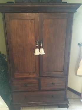 Wetherleys wooden cupboard.