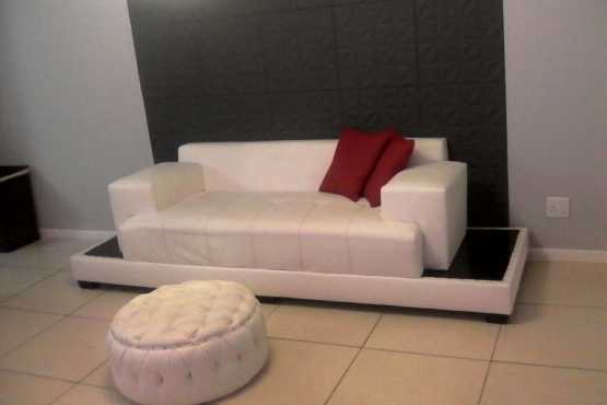 White bonded leather couch with large ottoman R2500-00