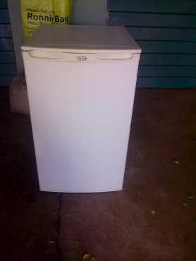 White DEFY 100L bar fridge with small freezer compartment inside ideal for student or single person