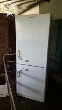 White Defy 320 liter double door fridge freezer (fridge top - freezer bottom) in very good condition