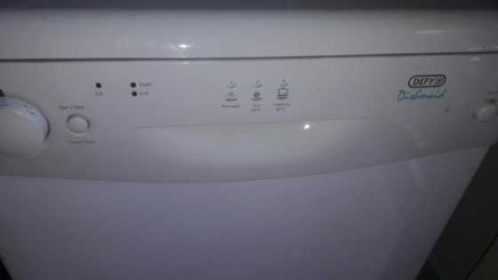 White Defy Dishwasher hardly used.