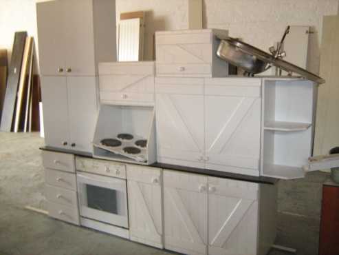 White Paint Techniqued Kitchen with Formica Counters