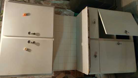 white steel kitchen cupboard