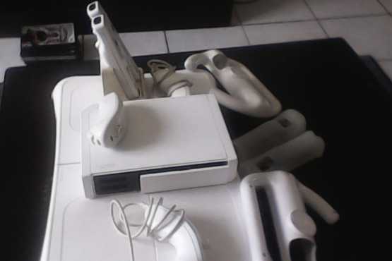 Wii console, 4 games and accessories