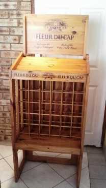 Wine rack from constansia with picture of old dutch house on it