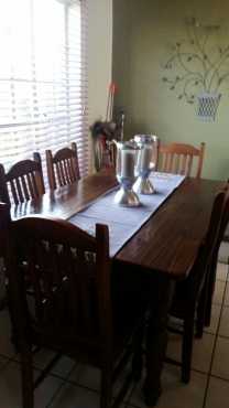 Wooden Dining room table and Chairs