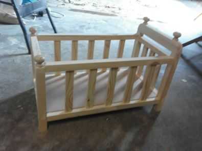 Wooden dolls cots