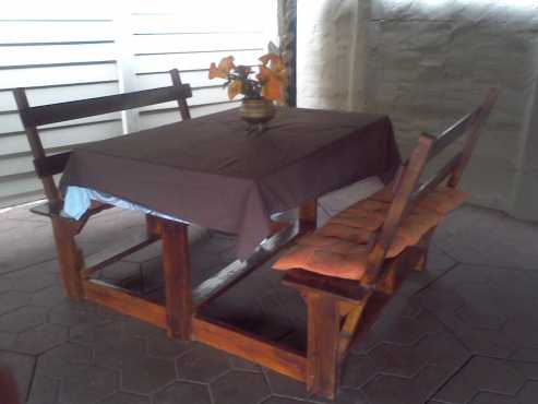 wooden table set with chairs