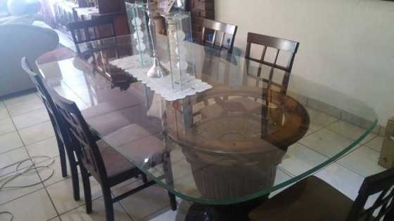 Wooden Table with glass top and 6 chairs