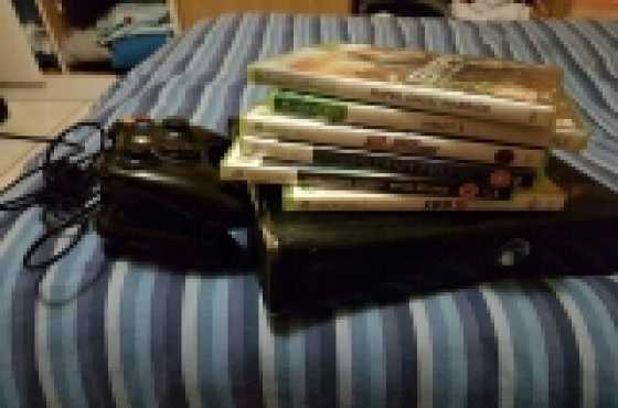 x box 360 with 6 games and 2 controllers