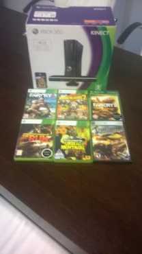 xbox 360 320gb  8games and 2 remotes