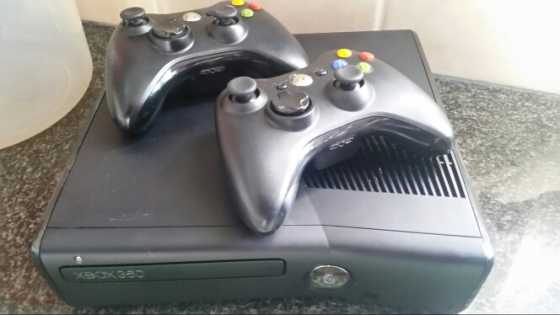 xbox 360 slim with 2 controls