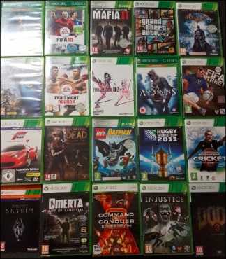 Xbox 360 (still has original packaging)  11 games  2 remotes