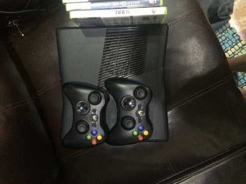 Xbox 360 with 2 remotes and 11 games