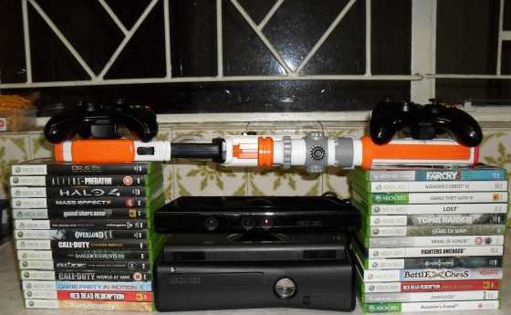 Xbox 360 with Kinect  2 remotes  Rifle  25 games