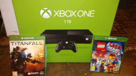 xbox one 1TB with headset. remote. 2games
