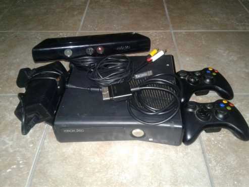 Xbox360,kinect,twee remotes,nitho charger en ses games