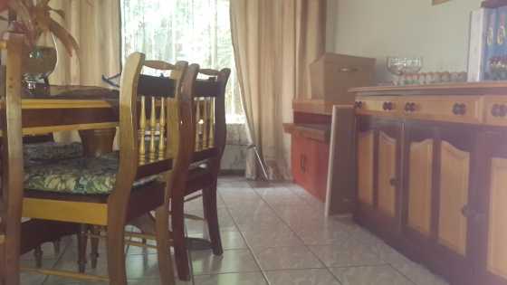 Yellow wood dining room set with side board