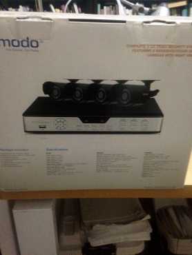 Zmodo Complete 4 channel video security system, 4 indooroutdoor CMOS. Night vision. Never used.